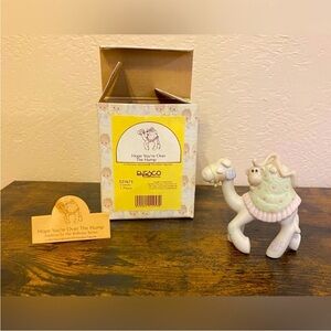 Precious Moments figurine: “Hope You’re Over The Hump”